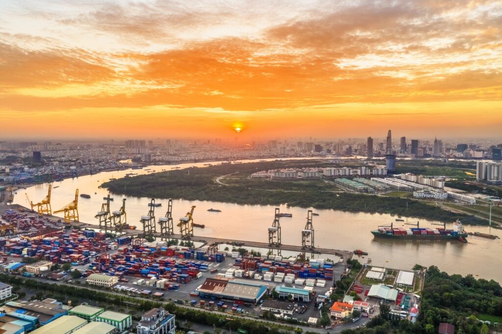 Logistics And Transportation Of Container Cargo Ship And Cargo Plane With Working Crane Bridge In Shipyard, Logistic Import Export And Transport Industry Background, Ho Chi Minh City, Vietnam